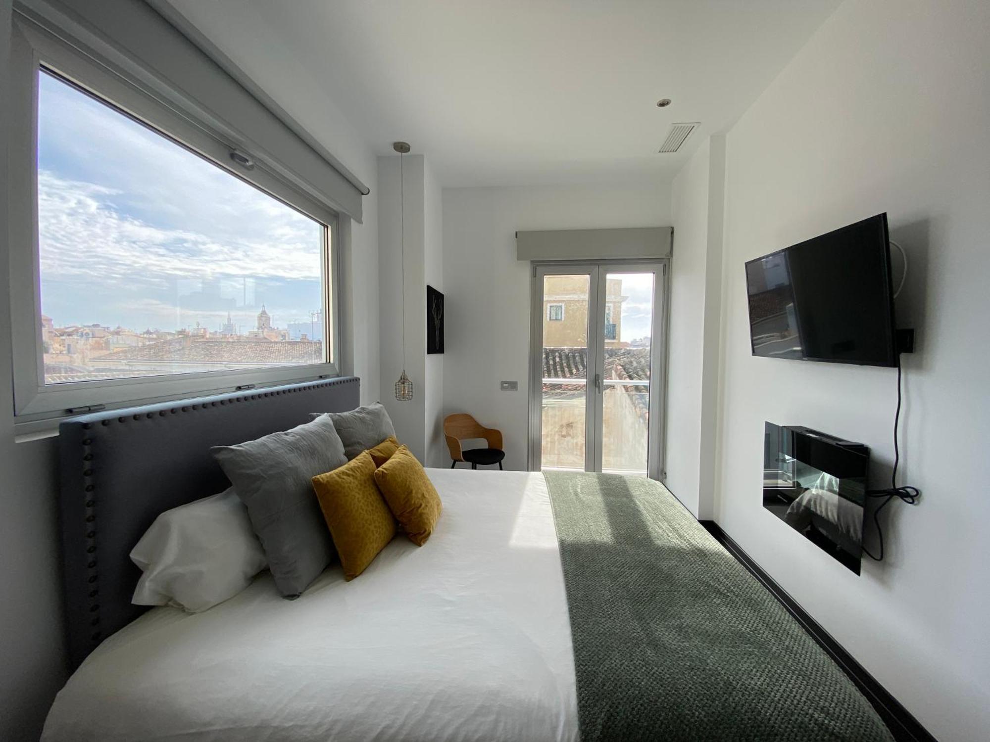 Stay U-Nique Apartments Rosaleda Малага Номер фото